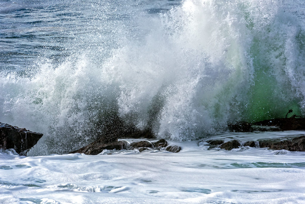 Photo of a wave crashing on the shore of Bean Hollow State Park, Pacifica, California, by visionbypixels.com