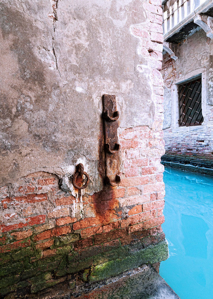 Photo of a colorful waterway in Venice, Italy.